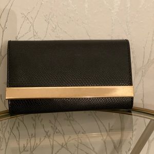 Black and gold clutch